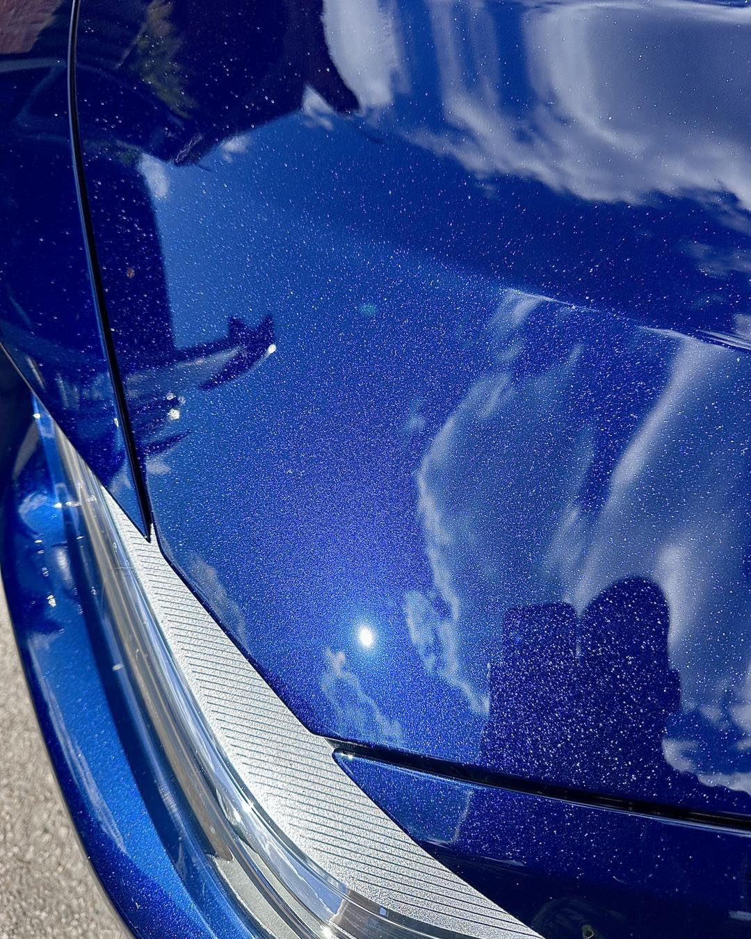 An image of paint correction on metalic paint